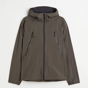 h&m water-repellent shell jacket in “khaki green”